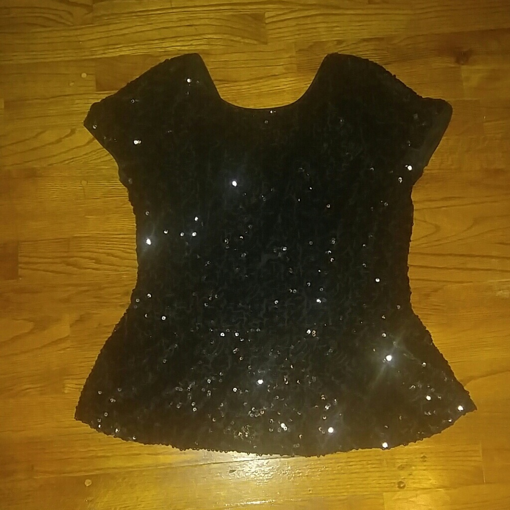 Black sequin peplum top